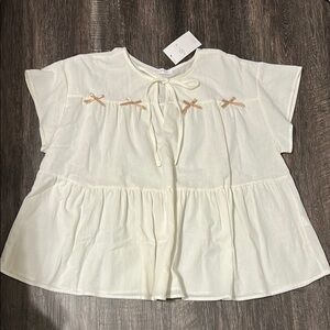 Cream Women’s Top with Bow Accents